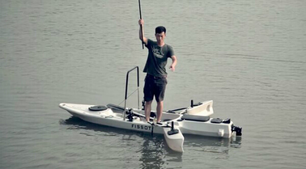 standing kayaking while fishing